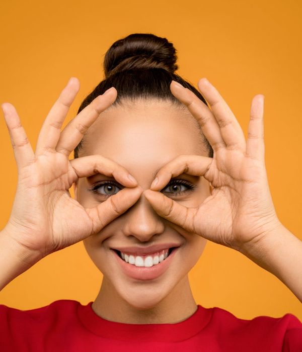 A woman with a vibrant and energetic look, suggesting a positive lifestyle.